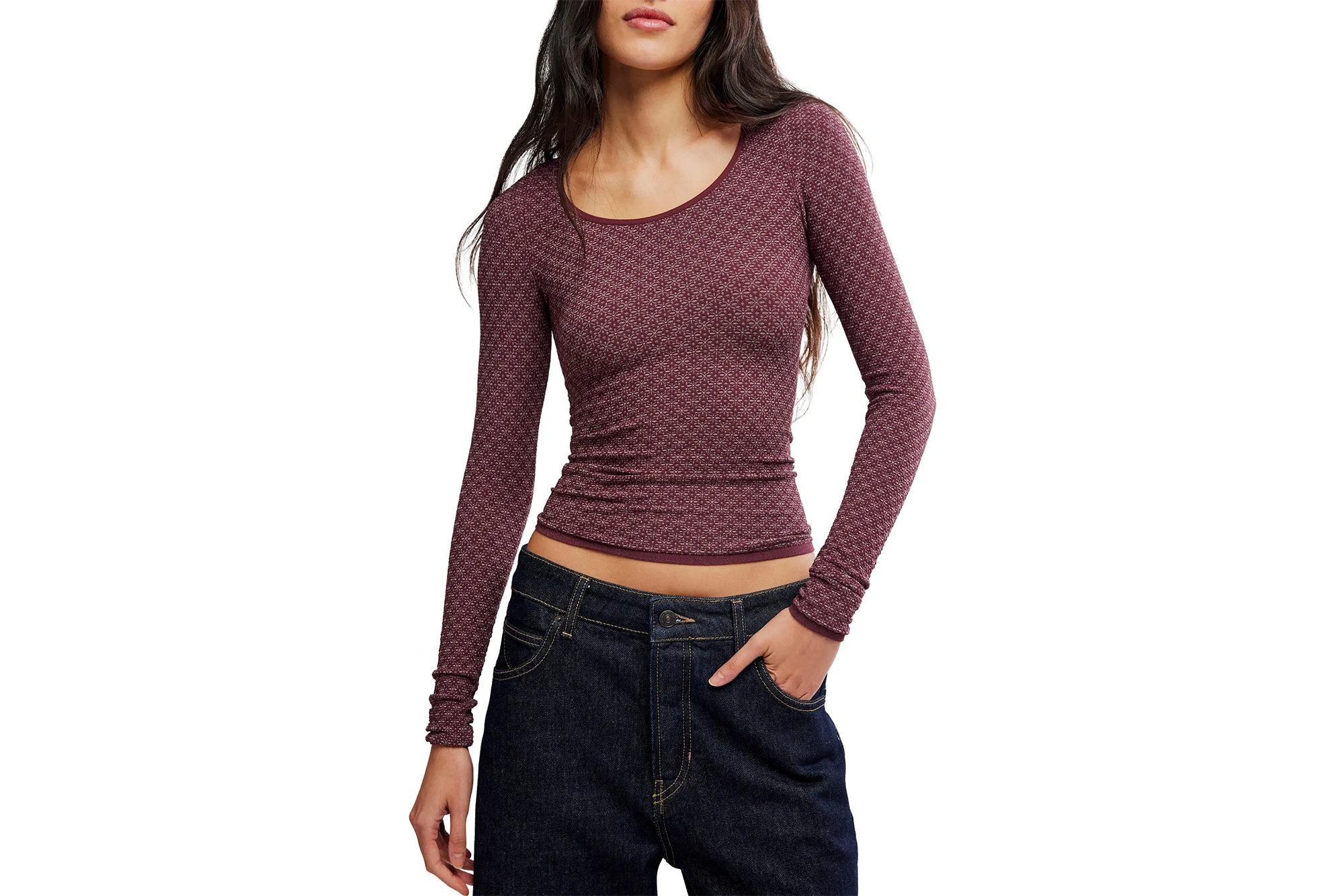 Nordstrom Anniversary Sale Has Nice Free Folks Offers 8 A woman wearing a brown long-sleeved top with a subtle pattern and dark jeans.