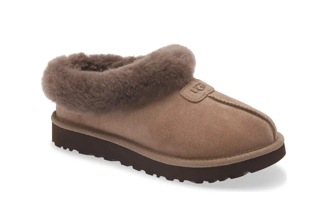 What Web page Six Editors Are Actually Shopping for at Nordstrom's Anniversary Sale 10 A light brown UGG slipper with a thick brown fur collar and a brown sole.