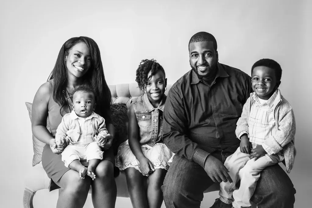 How Claudia Walker grew Black Mother and father' group chat to 40,000 members 2 Claudia Walker with her family when her children were younger. Empowering our youth starts early. (Photo courtesy of Claudia Walker)