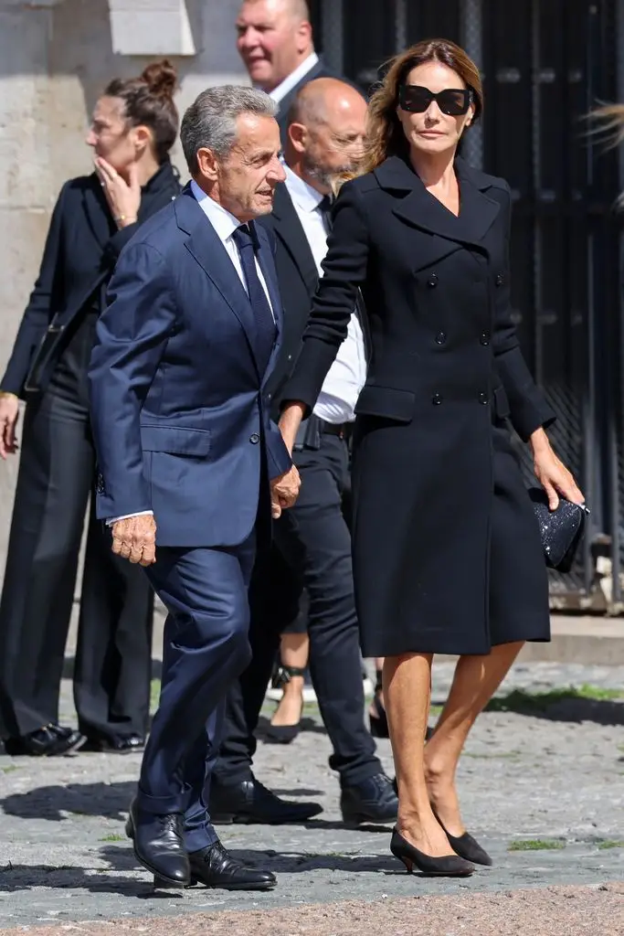 Claudia Schiffer, Beatrice Borromeo and Carla Bruni collect to bid farewell to Dior public relations supervisor Mathilde Favier at funeral in Paris 1 Nicolas Sarkozy and Carla Bruni attend the funeral of Mathilde Favier at Saint-Sulpice church on August 31, 2026 in Paris, France.