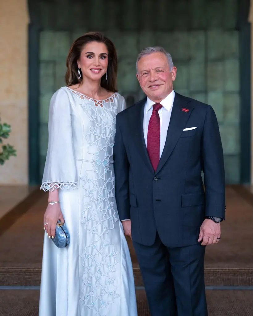 Queen Rania wore a design featuring intricate embroidery next to King Abdullah