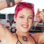 Pink's craziest photos showing off her legendary rock hard abs in bikinis and crop tops as she celebrates her 47th birthday