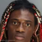 Florida man arrested for burglary after hiding under couple's bed at Miami hotel
