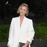 Charlize Theron appears at a festival with champagne and other articles from the column