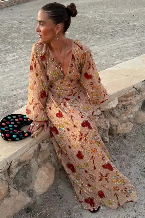 Duchess Sophie, 61, strikes gold in a cascading autumn gown that turned heads 2 This pattern from Never Fully Dressed looks just like Sophie's ensemble.