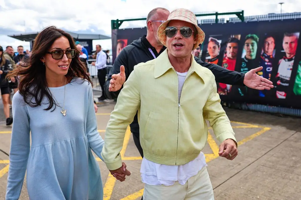 Brad Pitt's girlfriend Ines de Ramon turns up the warmth in a skimpy leather-based costume for a runwayside date 1 Brad Pitt, star of the upcoming film