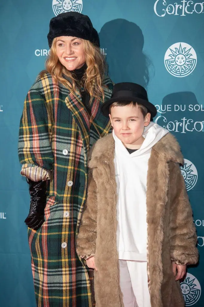 Inside Jaime Winstone's Off-Display screen Life: From Emmy-Profitable Dad to Well-known Ex Linked to British Pop Royalty 4 Jaime Winstone stands next to a young boy, both smiling at an event.