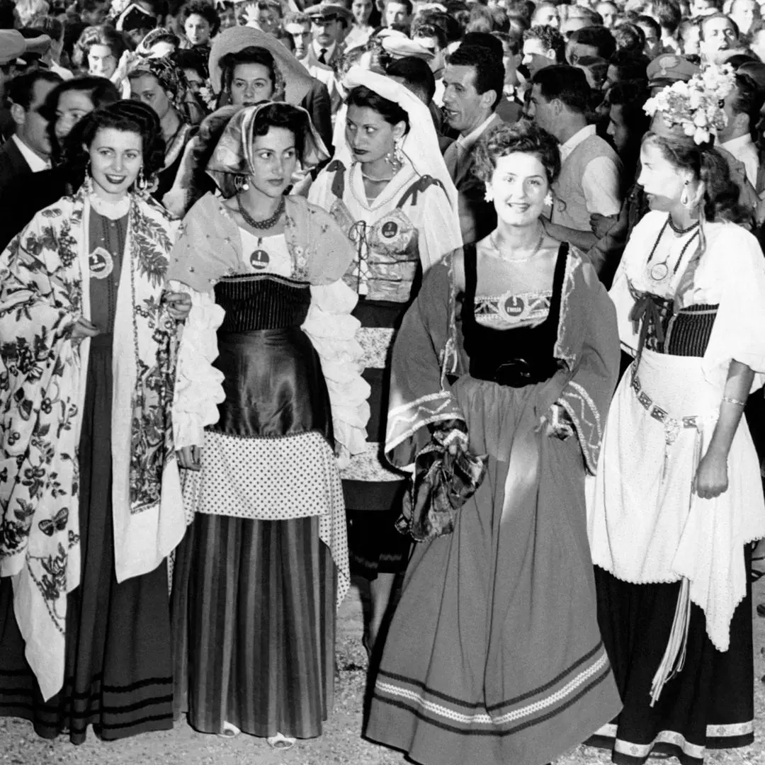 First day of the 'Miss Italy' election during which each candidate wears the costume of the region she represents, in the center, the young Sophia Loren who is still called Sofia Scicolone, in Salsomaggiore Terme, Italy, September 2, 1950.