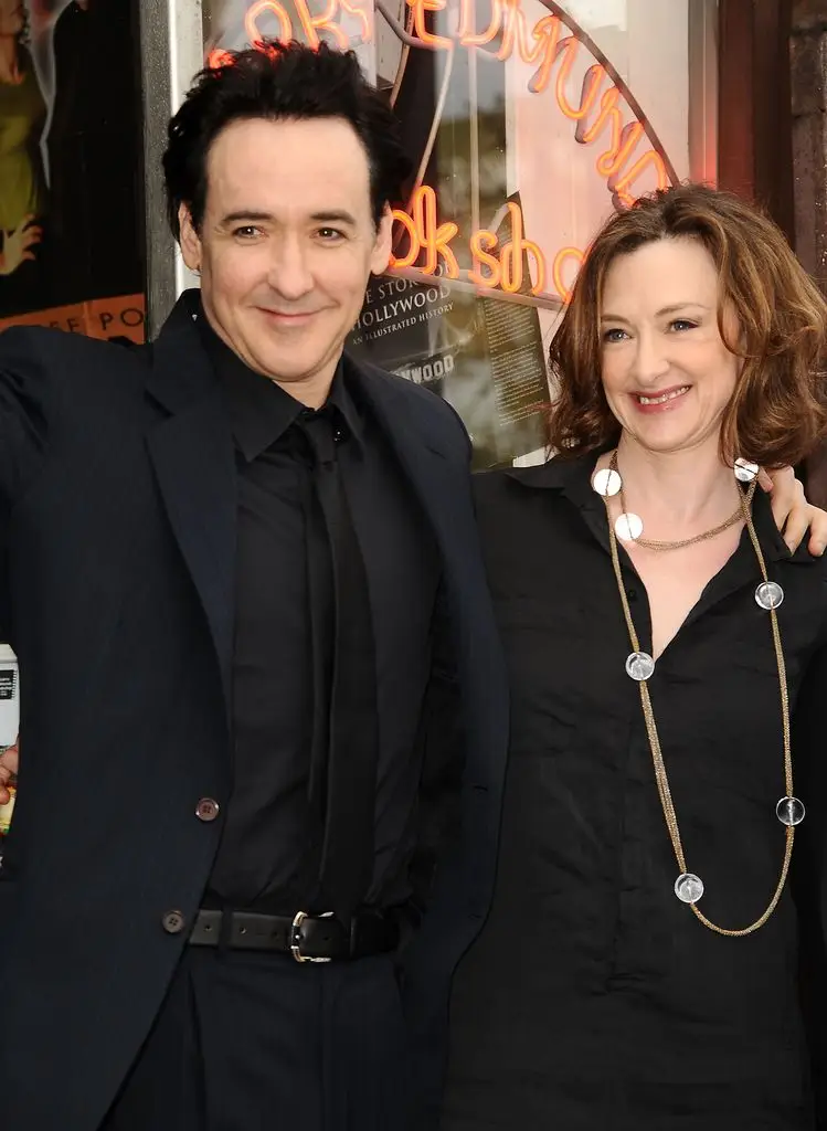 John Joan Cusack smiling