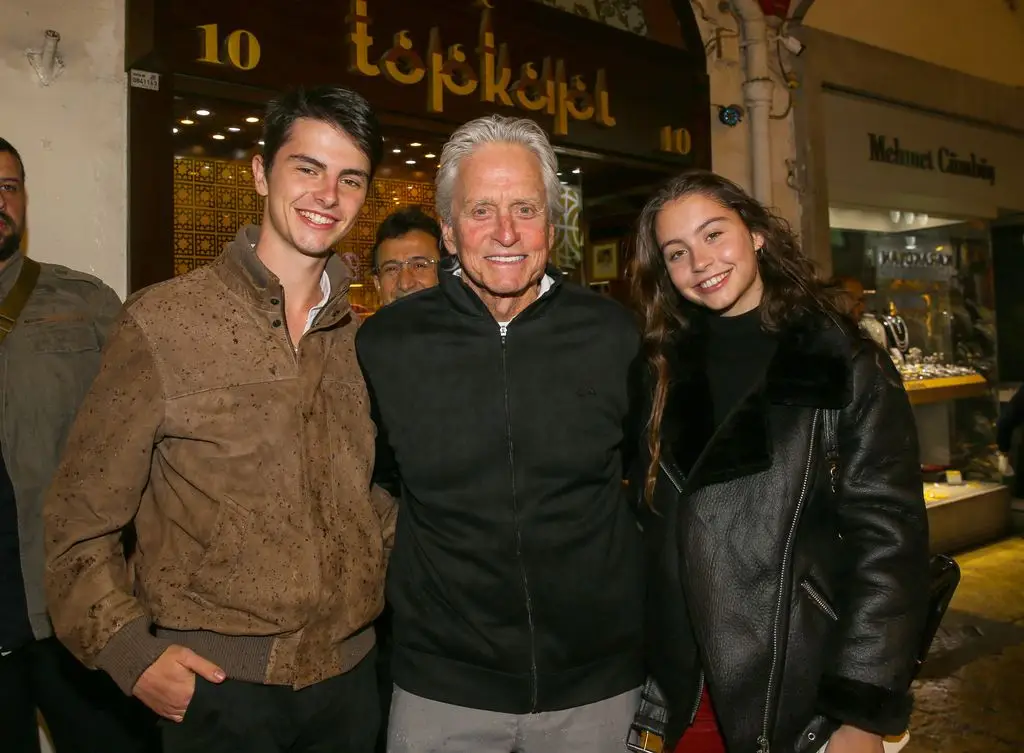 Michael Douglas poses for a photo with his daughter Carys and son Dylan at the Grand Bazaar on the 3rd day of their vacation in Istanbul, Turkey, January 6, 2020.