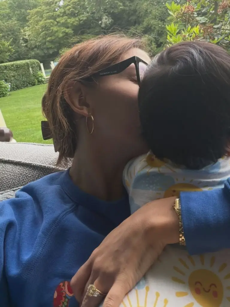 Millie Bobby Brown shares first glimpse of child boy in heartwarming household picture 2 photo of Millie Bobby Brown kissing her baby daughter on the cheek