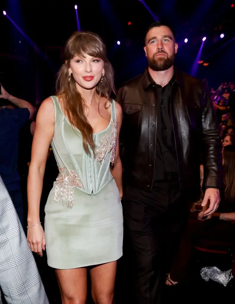 Taylor Swift and Travis Kelce's Gorgeous $5.35 Million Mansion Revealed 1 Taylor Swift Travis Kelce walking