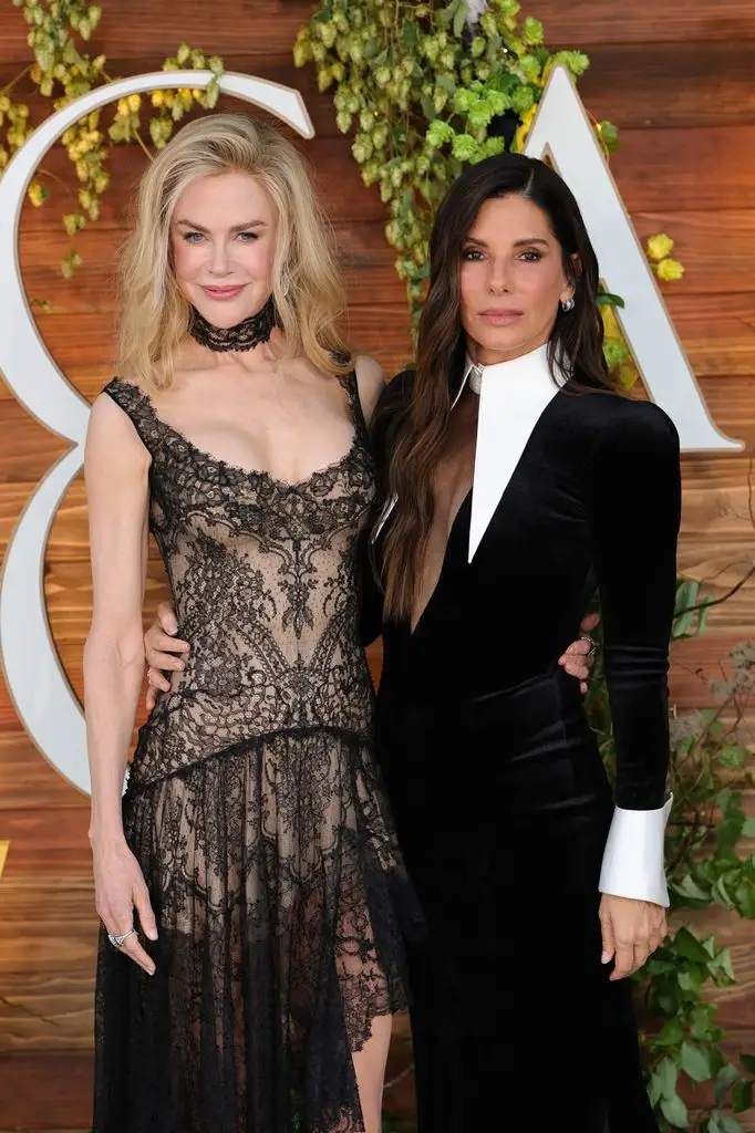 Sandra Bullock's two 'utterly totally different' kids, Louis and Laila, step into the highlight 1 Nicole Kidman and Sandra Bullock side by side
