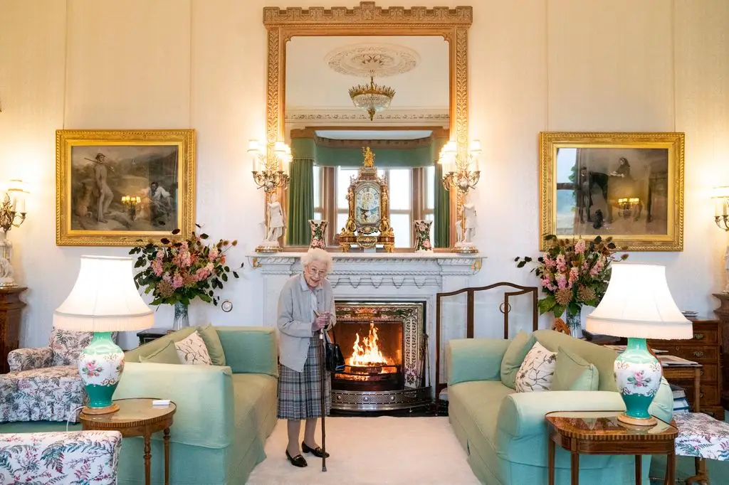 ABERDEEN, SCOTLAND - SEPTEMBER 06: Queen Elizabeth II waits in the drawing room before receiving newly elected Conservative Party leader Liz Truss at Balmoral Castle for an audience where she will be invited to become Prime Minister and form a new government on September 6, 2022 in Aberdeen, Scotland. The Queen broke with tradition to meet the new Prime Minister and Buckingham Palace, after having to stay at Balmoral Castle due to mobility issues. (Photo by Jane Barlow – WPA Swimming Pool/Getty Images)