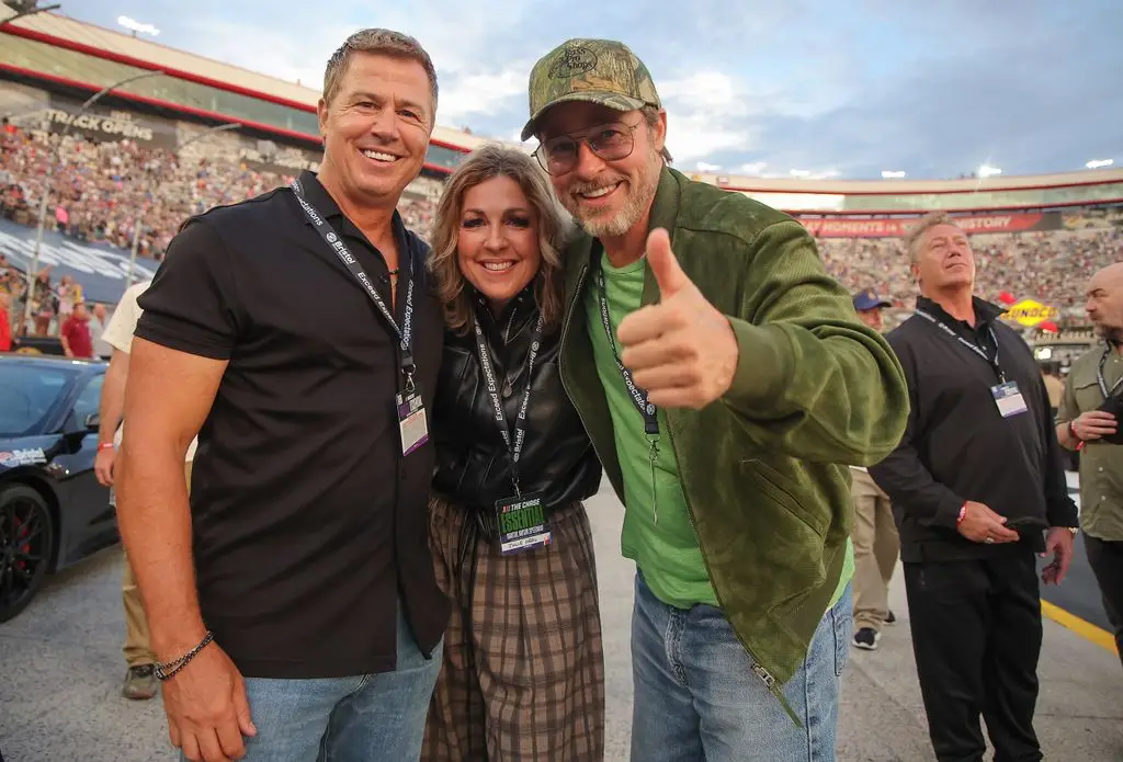 Grand Marshals Brad Pitt (R) poses with siblings Julie Neal and Doug Pitt on the grid before the Bass Pro Shops NASCAR Cup Series Night Race at Bristol Motor Speedway on September 19, 2026 in Bristol, Tennessee.