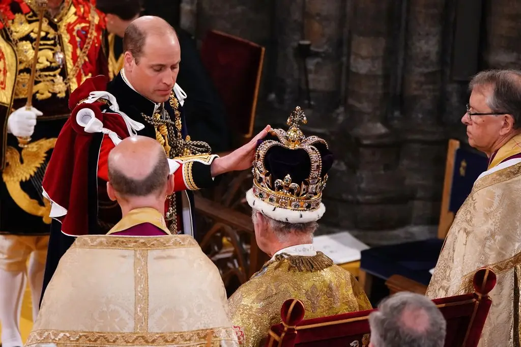 Prince William touching St Edward's crown during the king's coronation ceremony earlier this year