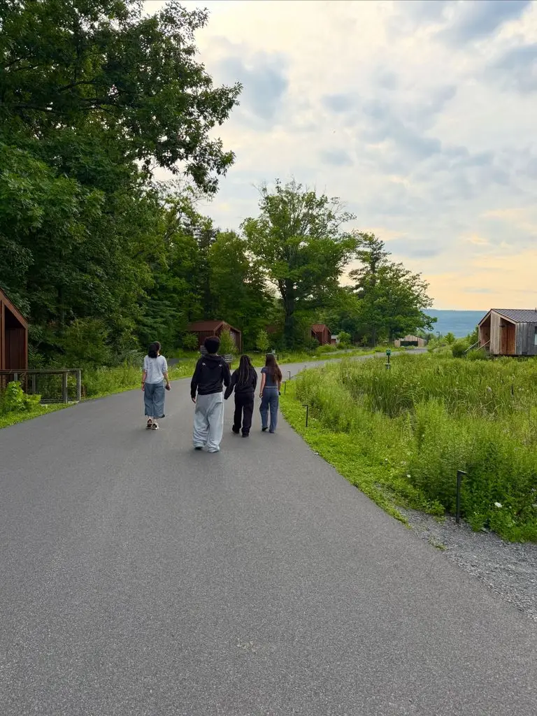 Sandra Bullock's two 'utterly totally different' kids, Louis and Laila, step into the highlight 2 Sandra Bullock shares a photo of her children Louis and Laila walking on a country road with her sister Gesine Bullock-Prado on Instagram