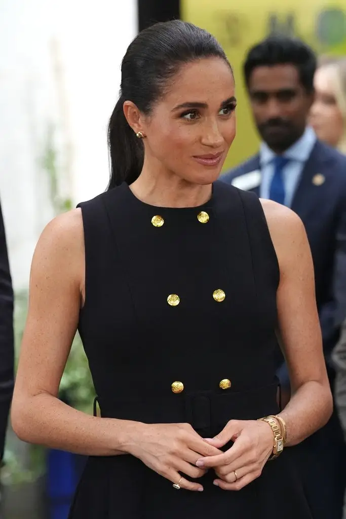 Meghan Markle shines in carefree new picture as King Charles makes large choice over UK return 3 Meghan, Duchess of Sussex, visits the Royal Children's Hospital in Melbourne on April 14, 2026. (Photo by Jonathan Brady/POOL/AFP via Getty Images)