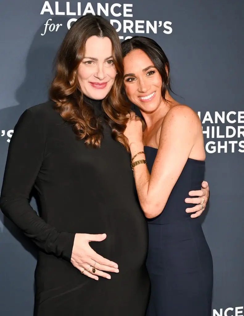 The handful of Meghan Markle's shut mates who stay in her unique UK interior circle 4 Kelly McKee Zajfen and Meghan, Duchess of Sussex, at the Children's Rights Alliance's 34th Champions for Children