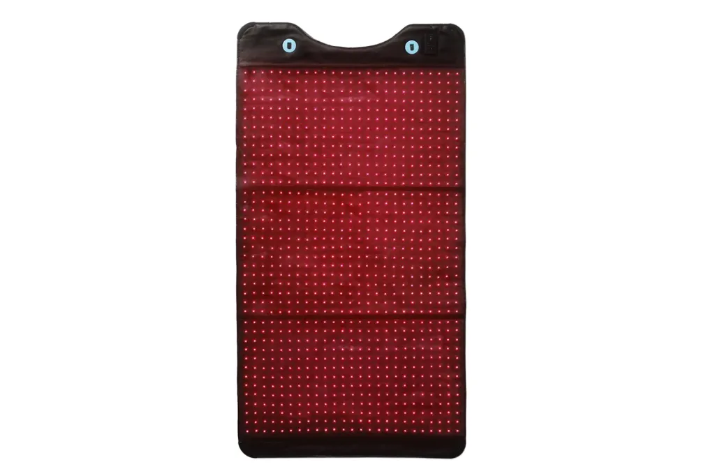 Red light therapy mat with two blue circular controls.