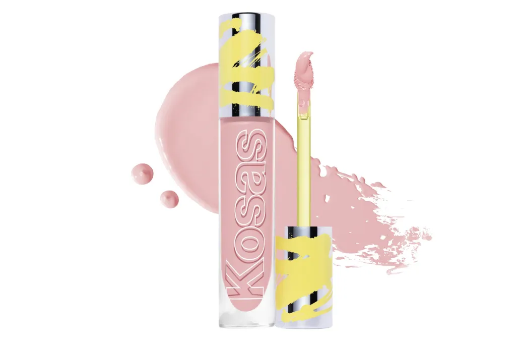 Kosas lipstick tube and applicator next to a pink lipstick stain.