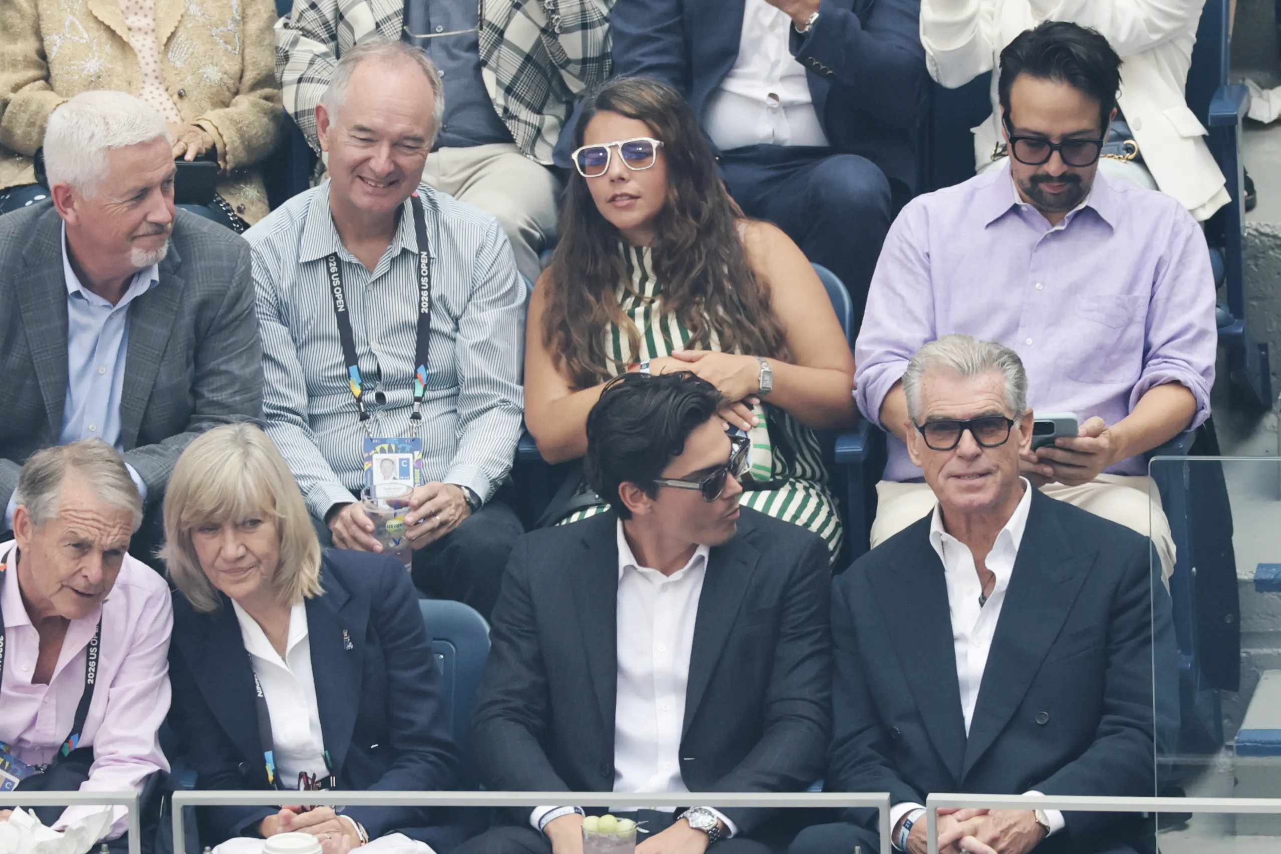 Lin-Manuel Miranda, Pierce Brosnan Lin-Manuel Miranda (top right) and Pierce Brosnan (bottom right) watch a tennis match.