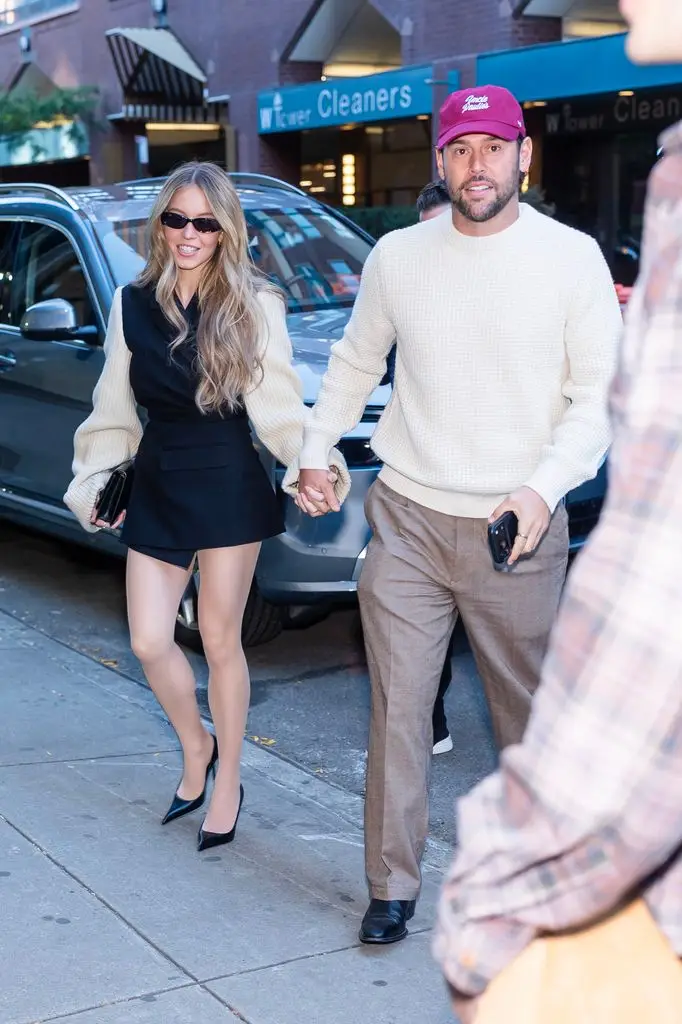 Sydney Sweeney actually stops site visitors in micro playsuit in New York 2 Sydney Sweeney (left) and Scooter Braun are seen in Union Square on October 18, 2026 in New York.