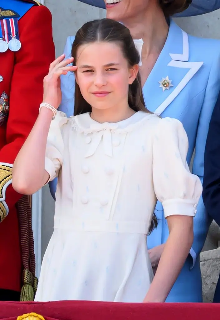 Princess Charlotte moving her hair