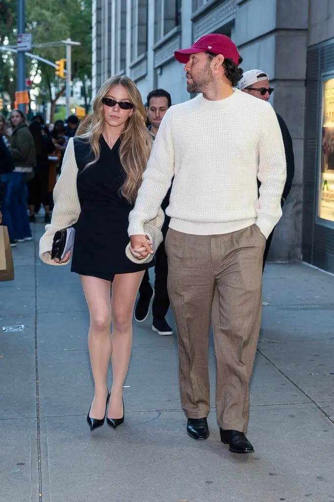 Sydney Sweeney actually stops site visitors in micro playsuit in New York 1 Sydney Sweeney (left) and Scooter Braun are seen in Union Square on October 18, 2026 in New York.