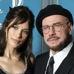 John Travolta's daughter Ella makes her Paris catwalk debut alongside famous faces