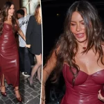 Sofía Vergara dazzles in a bodycon burgundy leather dress at Paris Fashion Week