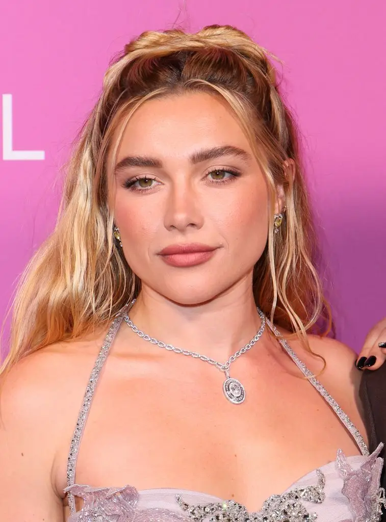 Florence Pugh stuns in plunging silver corset costume as she makes crimson carpet debut with boyfriend 2 The striking beauty has been dating Finn since 2024