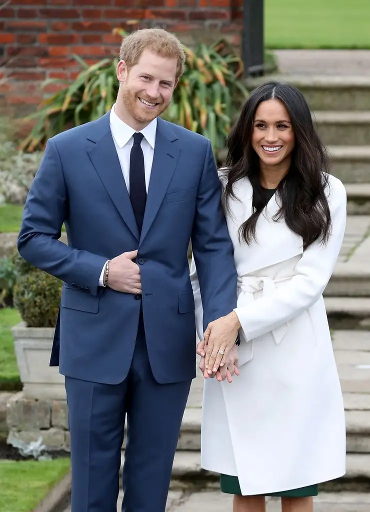 Prince Harry and actress Meghan Markle during an official photocall to announce their engagement at Sunken Gardens at Kensington Palace