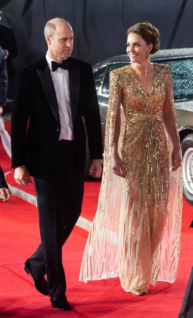 Queen Mathilde reinvents royal black tie in dramatic look liked by Kate Middletob 1 Kate Middleton wearing a gold Jenny Packham dress to the 2021 Bond premiere