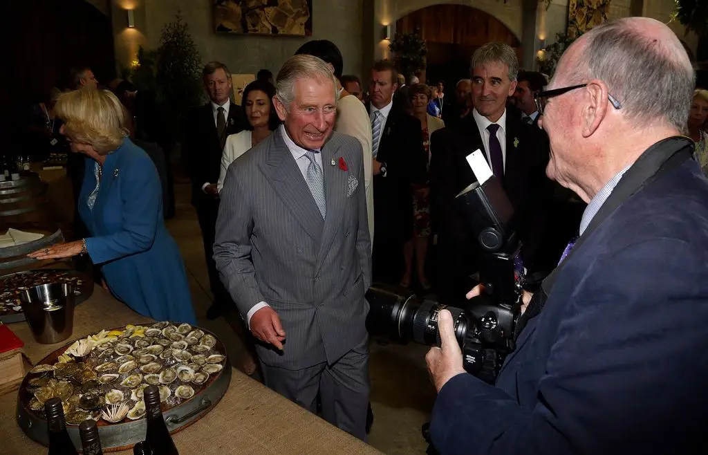King Charles' explosive arguments with royal photographer: 'A minimum of I've a job' 2 Charles and Arthur share a joke together in New Zealand in 2015