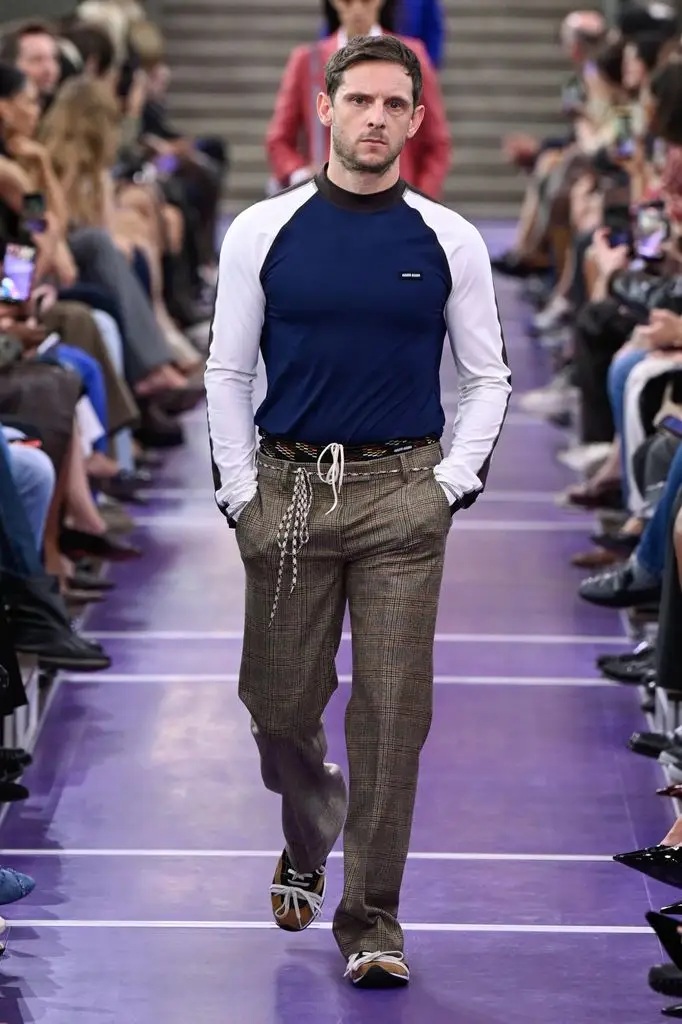 Actor Jamie Bell on the runway at the Miu Miu fashion show as part of Paris RTW Fashion Week Spring/Summer 2027 on October 04, 2026 in Paris, France.