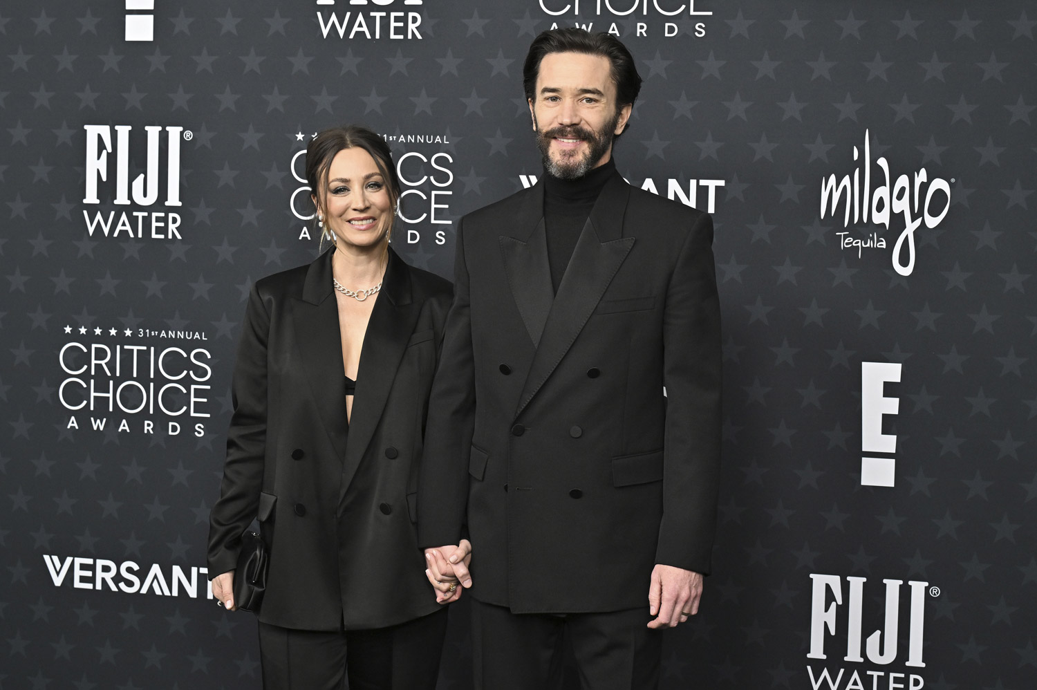 Kaley Cuoco and Tom Pelphrey at the 2026 Critics Choice Awards at Barker Hangar, Santa Monica