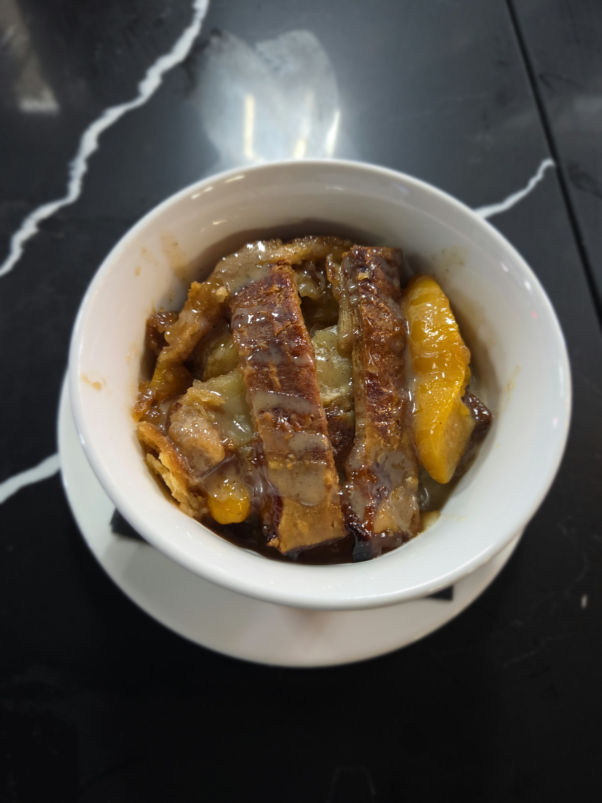Kitchen + Kocktails Expands to NYC: HBCU Grad Kevin Kelley Provides First Look to ESSENCE 3 Peach cobbler for the win.